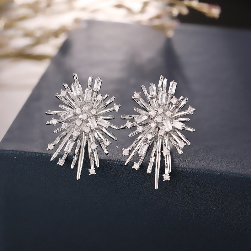 SILVER FIREWORK CLIP ON EARRINGS