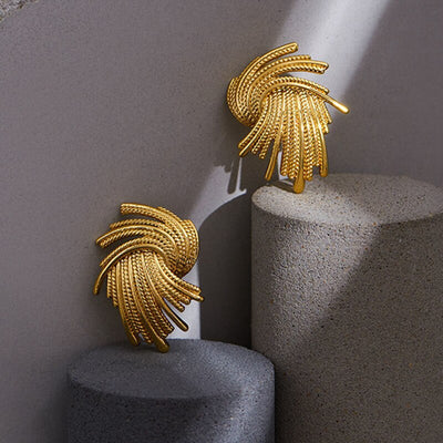 TWISTED CLIP ON EARRINGS