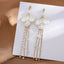 CHARMING PEARL FLOWER TASSEL CLIP ON EARRINGS